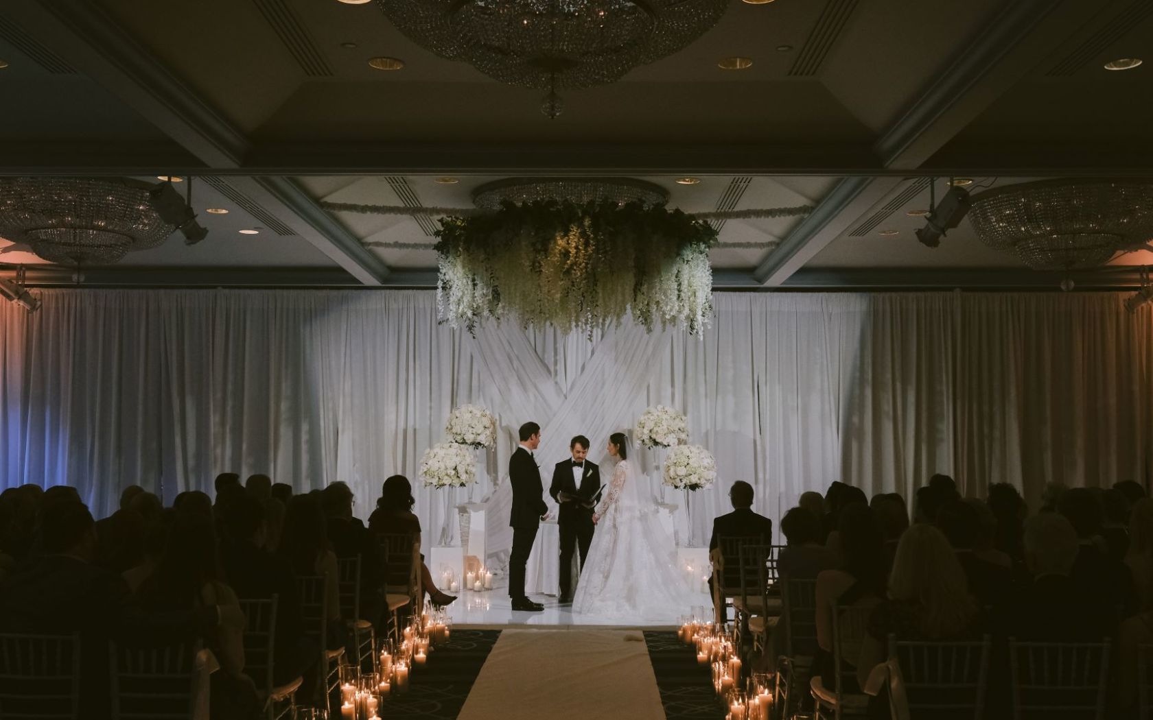 A Wedding Ceremony In A Large Room
